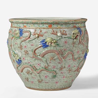 Lot 21 - A Chinese Famille Rose-decorated porcelain “Nine Dragon” jardinière