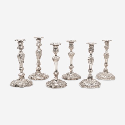Lot 28 - Three pairs of George III / Victorian weighted sterling silver candlesticks in the Rococo manner
