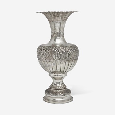 Lot 47 - A large sterling silver floral repoussé vase
