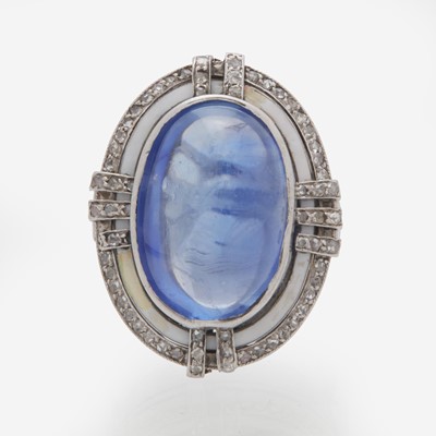 Lot 168 - A 14K White Gold, Sugarloaf Sapphire, and Diamond Ring