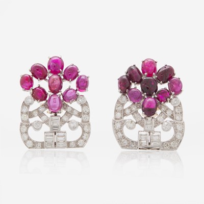 Lot 173 - A Pair of Platinum, Diamond, and Ruby Dress Clips Converted to Earrings