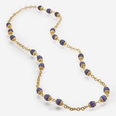 Lot 180 - An 18K Yellow Gold Bead Necklace