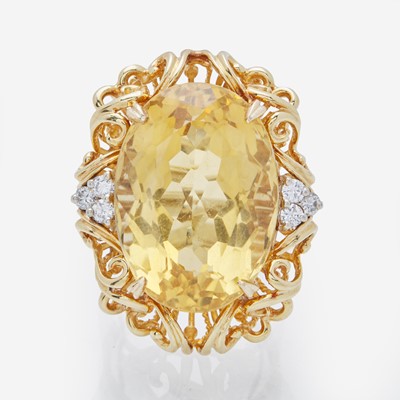 Lot 89 - A 14K Yellow Gold, Citrine, and Diamond Ring