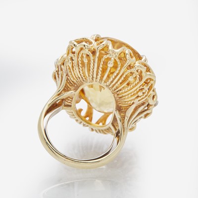 Lot 89 - A 14K Yellow Gold, Citrine, and Diamond Ring