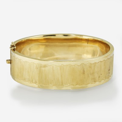 Lot 118 - A 14K Yellow Gold Bangle Bracelet