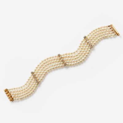 Lot 139 - A Multi-Strand Pearl and Diamond Bracelet