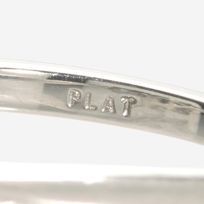 Lot 49 - A Platinum and Aquamarine Ring with Tiffany Diamond