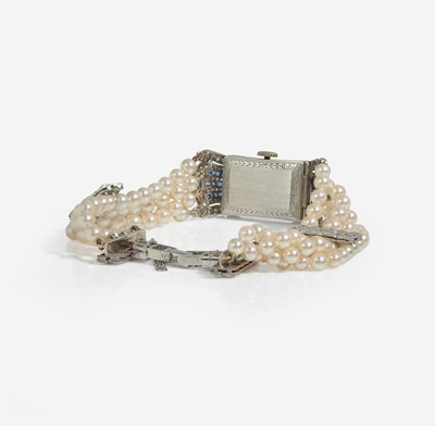Lot 71 - An Art Deco Pearl, Diamond, and Sapphire Watch