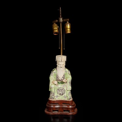 Lot 93 - A Chinese famille verte-decorated figure of Cai Shen, mounted as lamp 素三彩財神改制檯燈