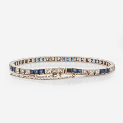 Lot 69 - A 14K White Gold, Sapphire, and Diamond Bracelet