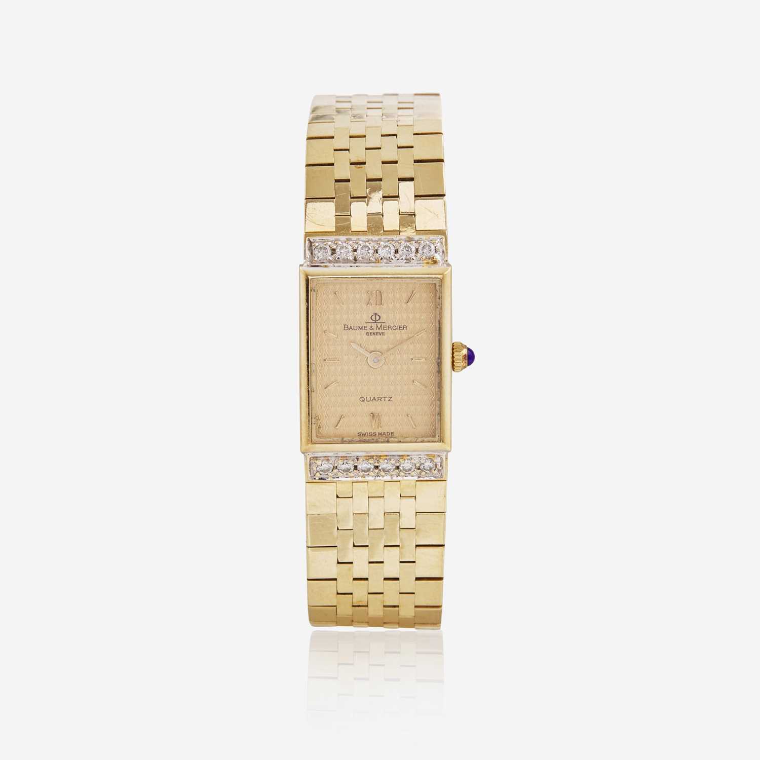 Lot 75 - A Baume & Mercier 14K Yellow Gold and Diamond Watch