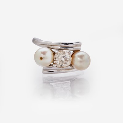 Lot 76 - A 14K White Gold, Diamond, and Pearl Ring