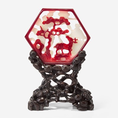 Lot 76 - An unusual small Chinese ruby-overlay glass table screen with carved wood stand 紅白雙色琉璃硯屏及木底座