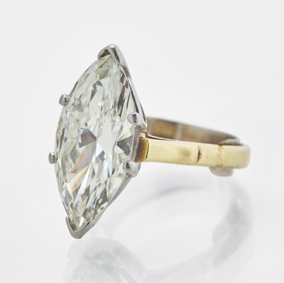 Lot 59 - A Platinum and 18K Yellow Gold and Diamond Ring