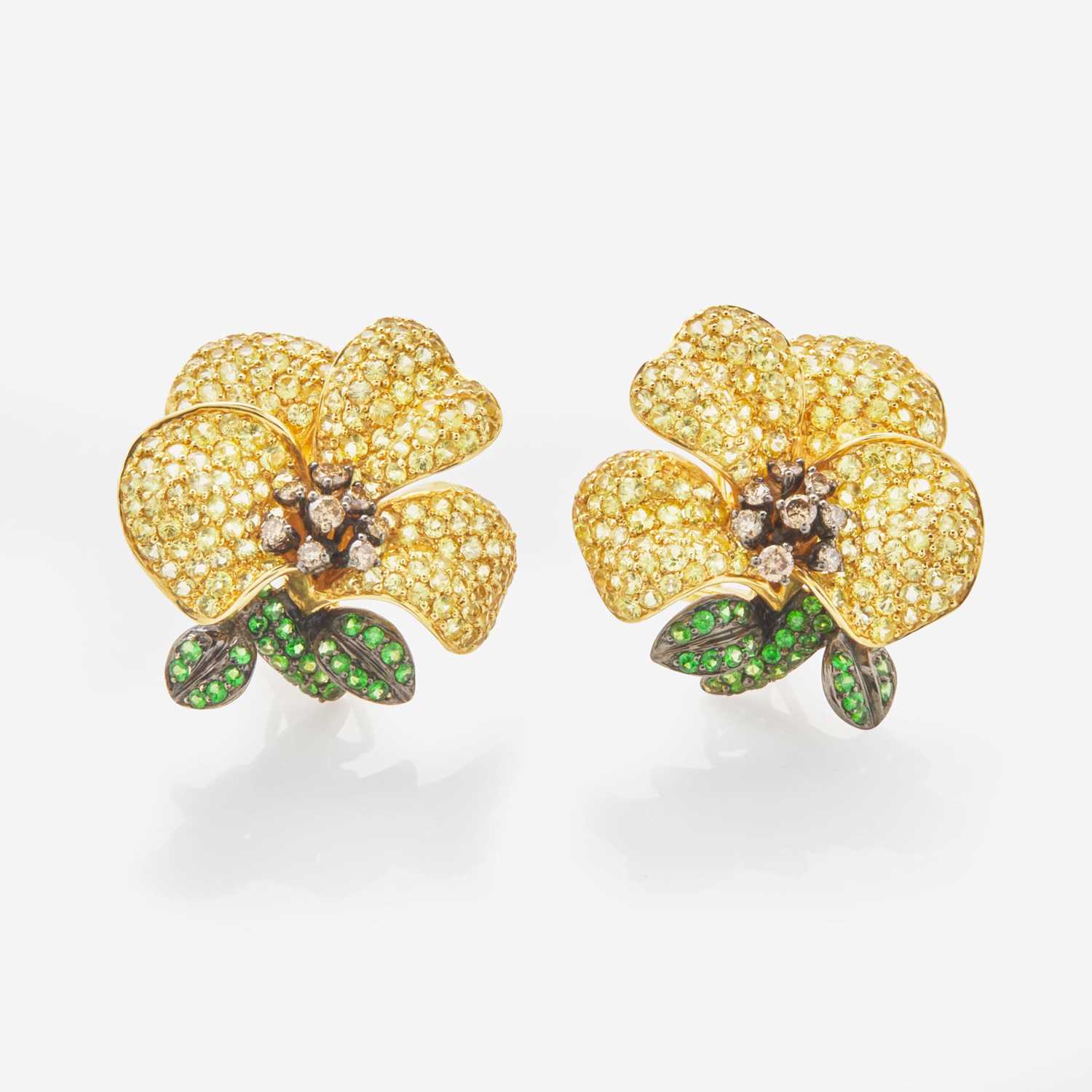 Lot 84 - A Pair of Yellow Topaz, Diamond and Emerald Flower Earrings