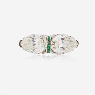 Lot 55 - A Pear-Shape Diamond and Emerald Ring
