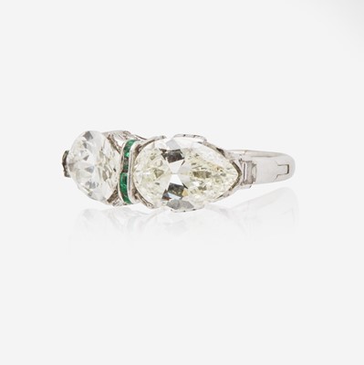 Lot 55 - A Pear-Shape Diamond and Emerald Ring