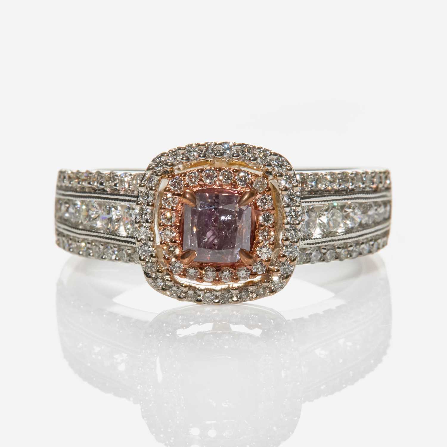 Lot 42 - A White Gold, Diamond, and Colored Diamond Ring