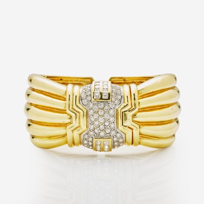 Lot 105 - A 14K Yellow Gold and Platinum Wide Cuff Bracelet