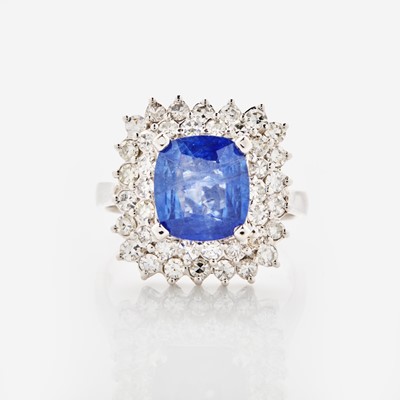 Lot 68 - A Sri Lankan Sapphire, Diamond, and 18K White Gold Ring