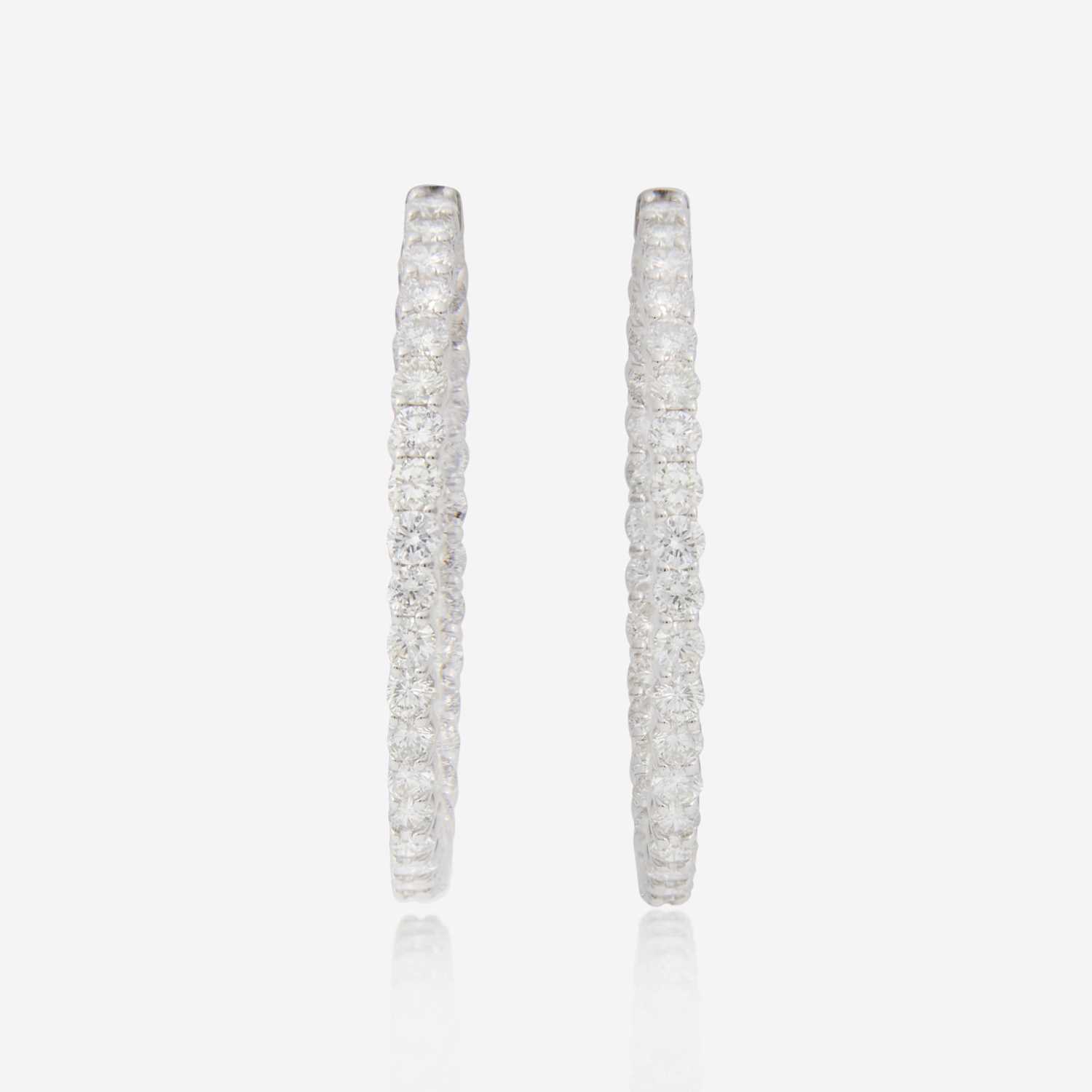 Lot 80 - A Pair of Diamond and 14K White Gold Earrings