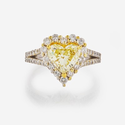 Lot 40 - A Heart-Shape Colored Diamond, Diamond, and 18K Gold Ring