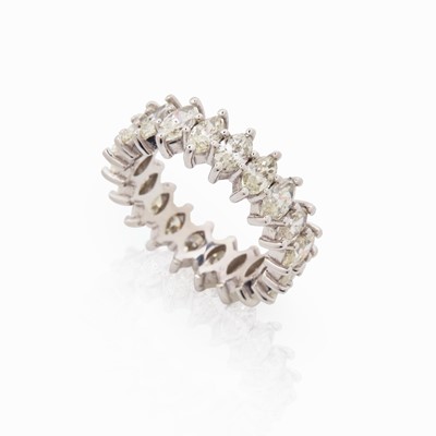 Lot 58 - A Diamond and 18K White Gold Eternity Band