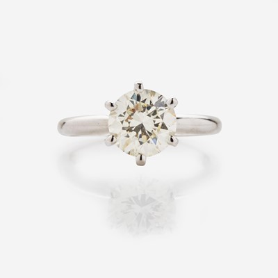 Lot 44 - A 14K White Gold Solitaire Diamond Ring