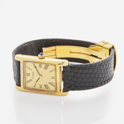 Lot 66 - Ladies 18K Yellow Gold Cartier Tank Wristwatch