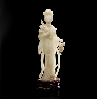 Lot 58 - A Chinese carved white jade figure of a meiren 白玉雕美人