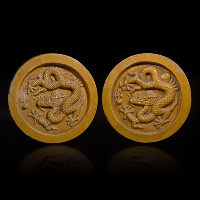 Lot 36 - Two Chinese yellow glazed "Dragon" roof tile ends 黃釉龍紋瓦當兩片
