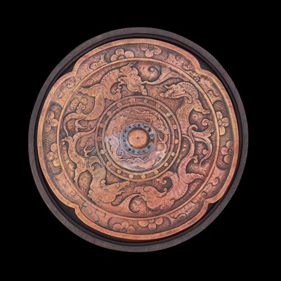 Lot 9 - A Chinese carved "Mirror" inkstone with hardwood box 仿銅鏡硯台及木盒