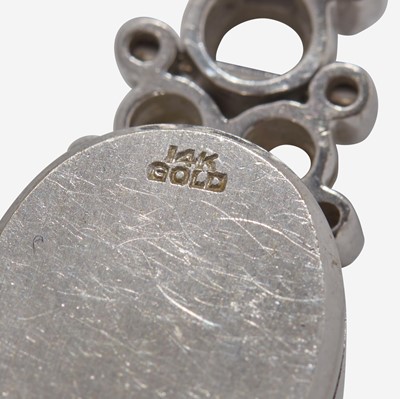 Lot 53 - A 14K White Gold and Diamond Bracelet Watch
