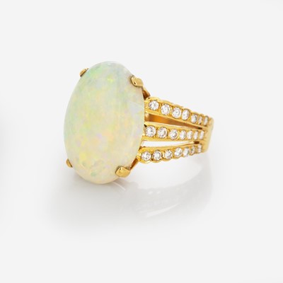 Lot 35 - An 18K Yellow Gold, Diamond, and Opal Ring
