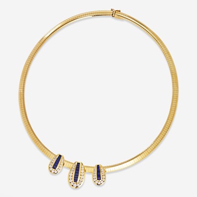 Lot 44 - A 14K Yellow Gold, Diamond, and Sapphire Omega Slider Necklace