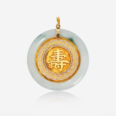 Lot 14 - A 14K Yellow Gold and Jade Pendant