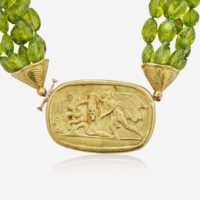 Lot 18 - An 18K Yellow Gold and Peridot Torsade Necklace