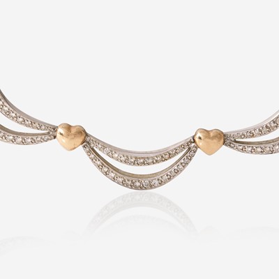 Lot 30 - A Two-Tone 14K Gold and Diamond Necklace