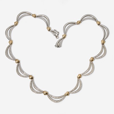 Lot 30 - A Two-Tone 14K Gold and Diamond Necklace