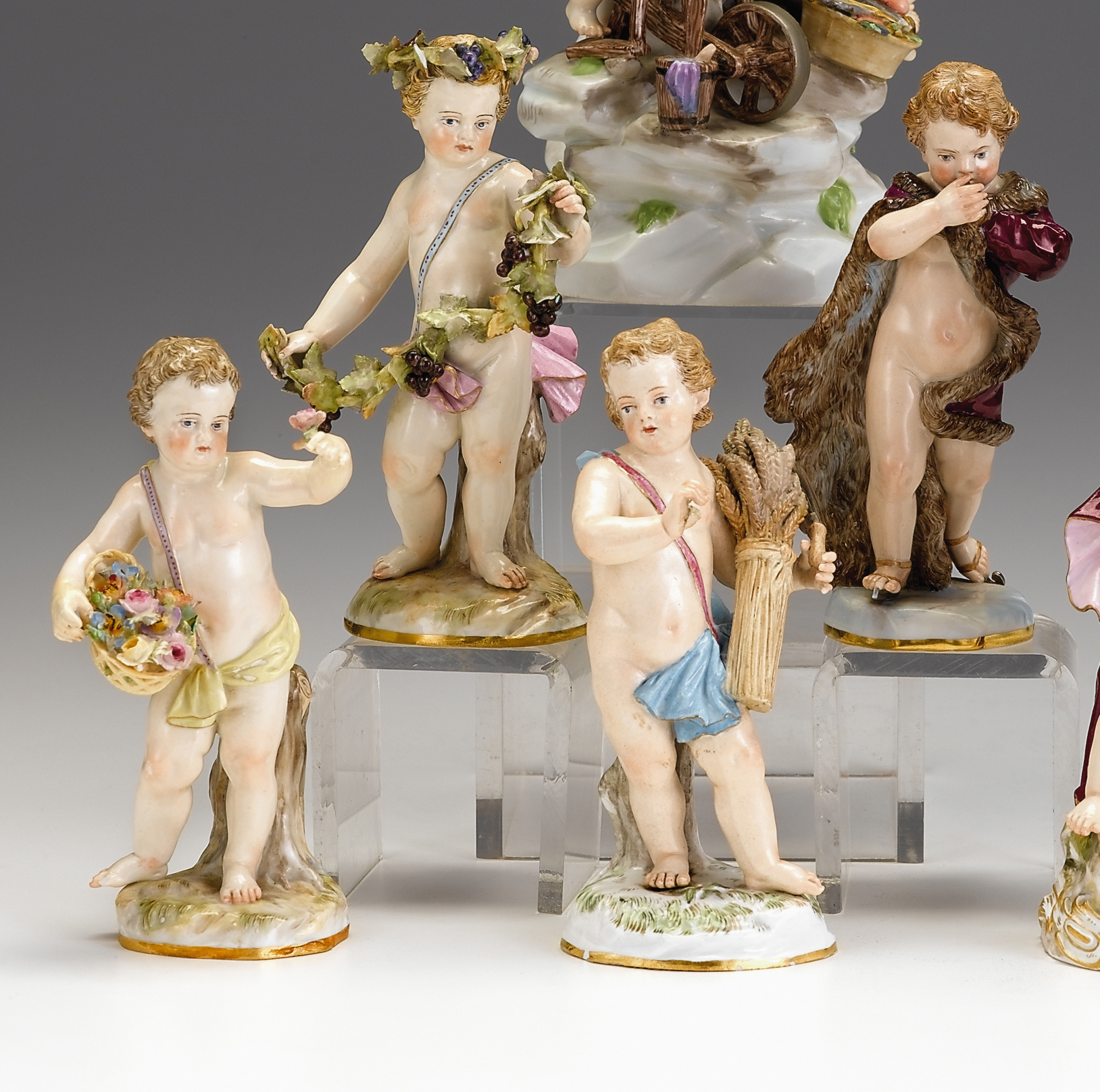 Lot 691 - Four Meissen figures emblematic of the