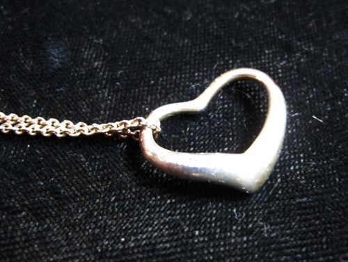 Lot 148 - Sterling silver heart pendant, Tiffany & Co.