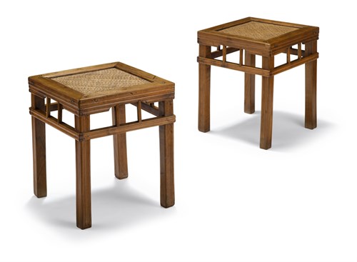 Lot 135 - Chinese yumu recessed leg side table and pair of carved nanmu and caned simulated bamboo stools