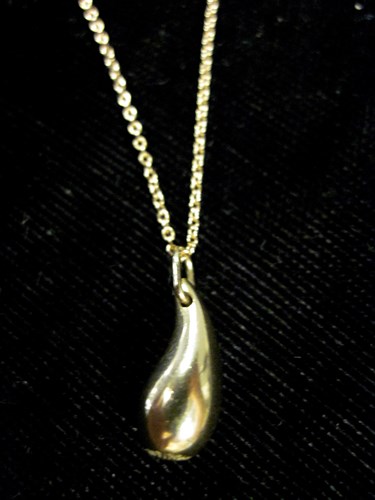 Lot 174 - 18 karat yellow gold drop pendant, Tiffany & Co.