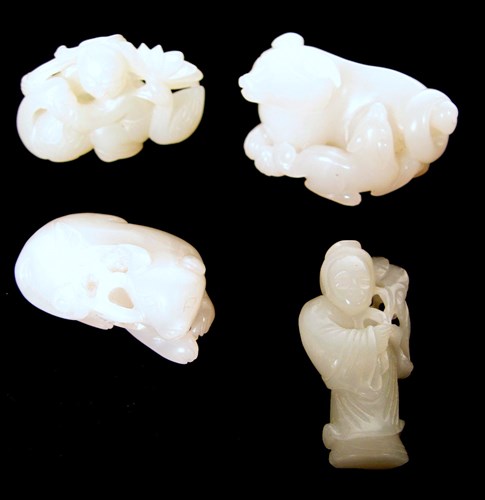 Lot 284 - Four Chinese white jade carvings