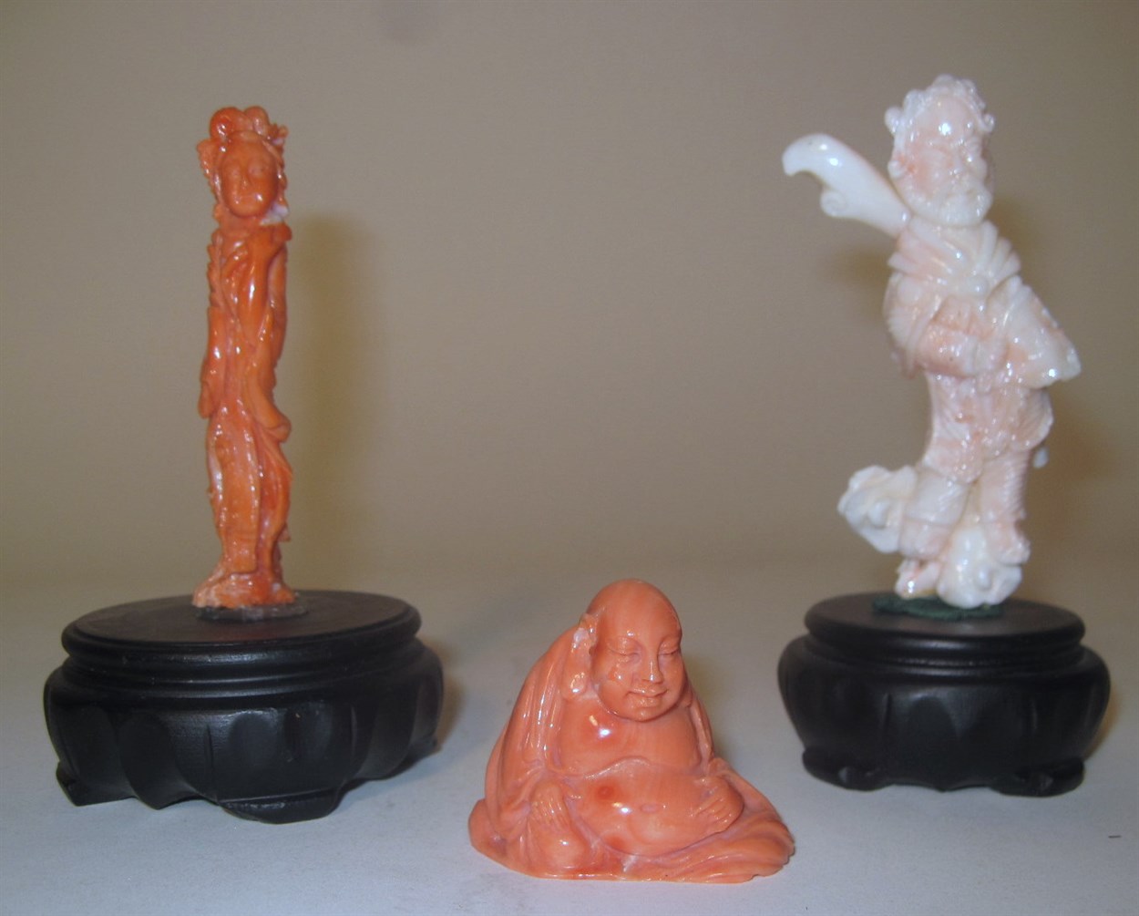 Lot 168 - Three small Chinese coral carvings