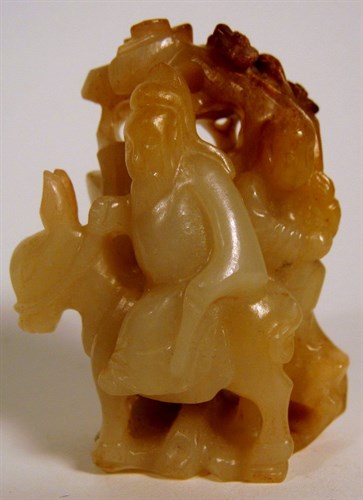 Lot 260 - Chinese celadon jade figural carving