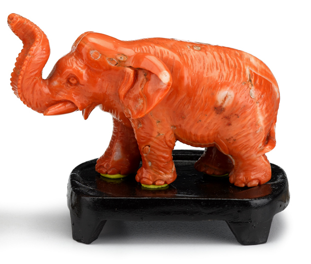 Lot 166 - Chinese carved coral elephant