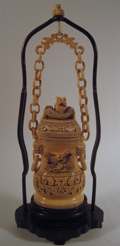 Lot 248 - Chinese elephant ivory covered hanging vase, with wood stand