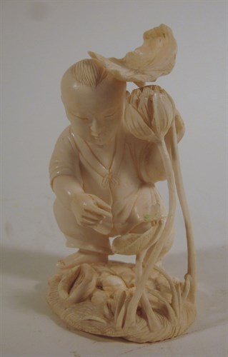 Lot 204 - Chinese elephant ivory carving of a boy