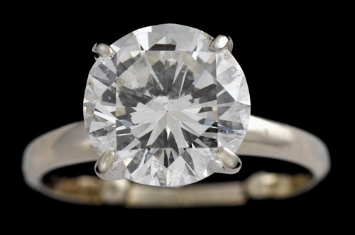 Lot 92 - 14 karat white gold and diamond engagement ring